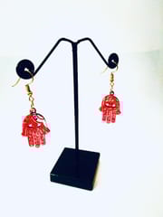 HAMSA EARRINGS IN ENIGMA ARTWORK