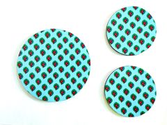 Mor Pankh Round Mat and Coaster Set