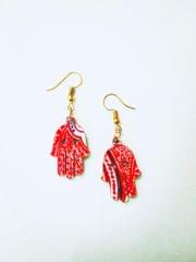 HAMSA EARRINGS IN ENIGMA ARTWORK