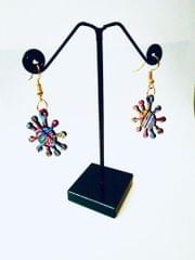 SUN EARRINGS IN IT'S ALL CONNECTED ARTWORK