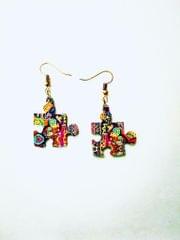 PUZZLE EARRINGS IN ARTWORK WHEN COLORS SPEAK