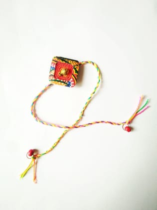 Doting Diamond Shaped Rakhi