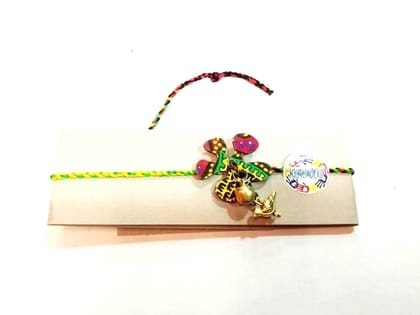 triumph- Handcrafted Rakhi