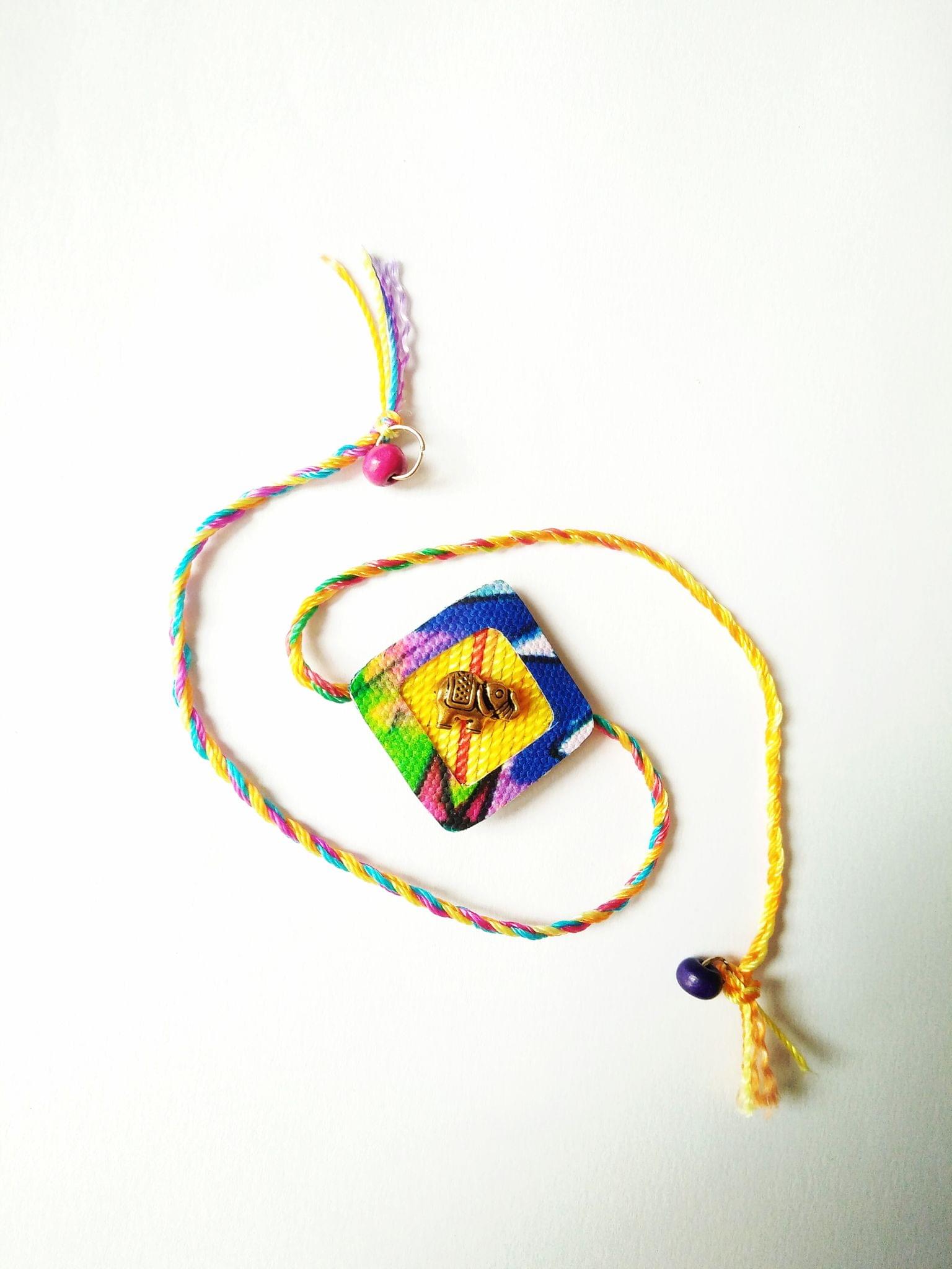 Lemony Diamond Shaped Rakhi