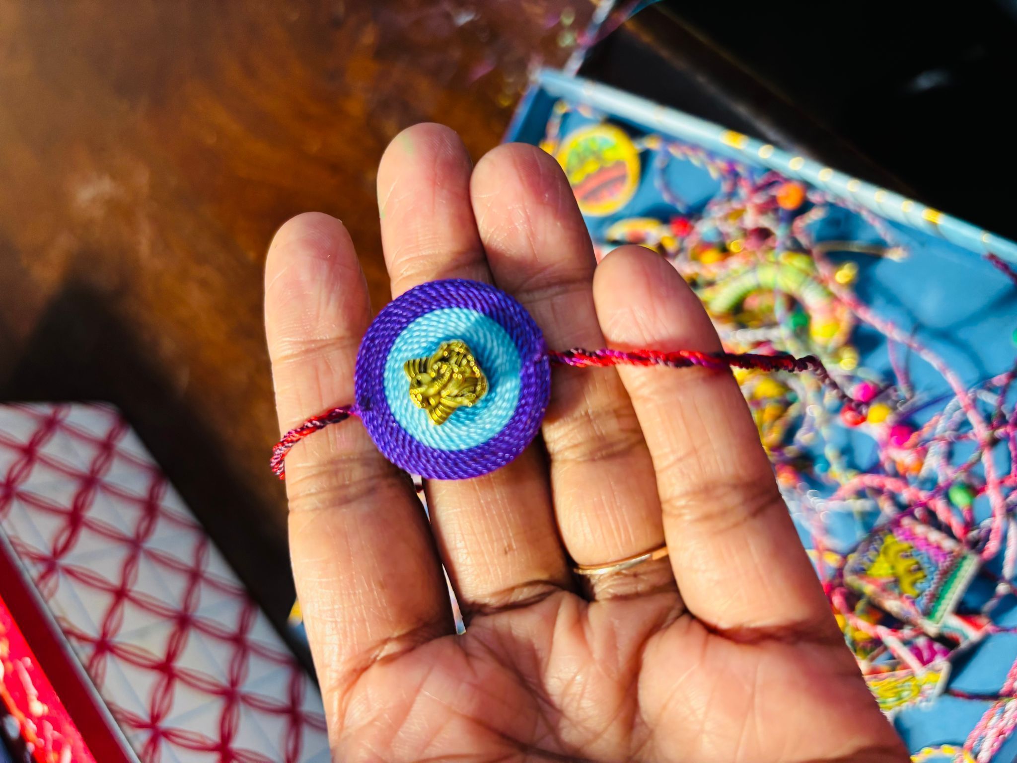 Festive Hues Ganesha Rakhi - Blue and Purple