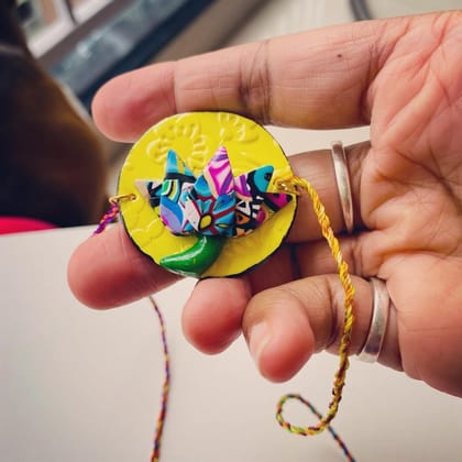 Lotus Clay Rakhi - 1 piece