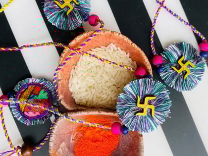 Aqua Fireworks Swastik Rakhi - 1 piece